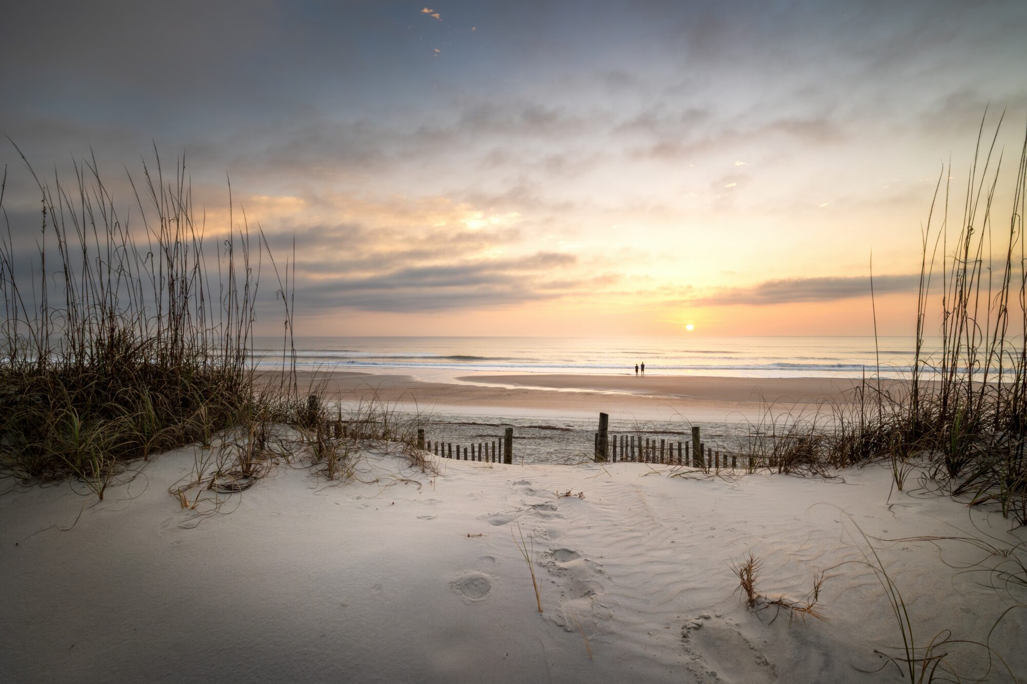 The sun rises over Amelia Island, Florida, on a quiet morning where the dunes give way to open water. It's a long way from the mountains, but it's worth the trip.